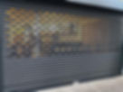 Shutters closed at a shop.