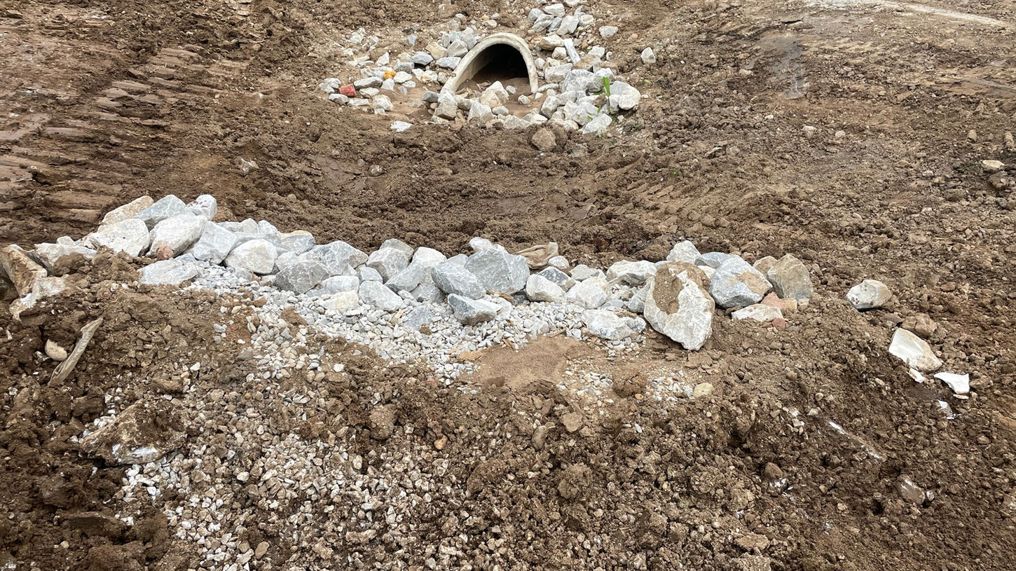 Benchmark Excavation LLC In The Process Of Installing A Culvert And Drainage Swale For A Large Commercial Complex In Indianapolis Indiana