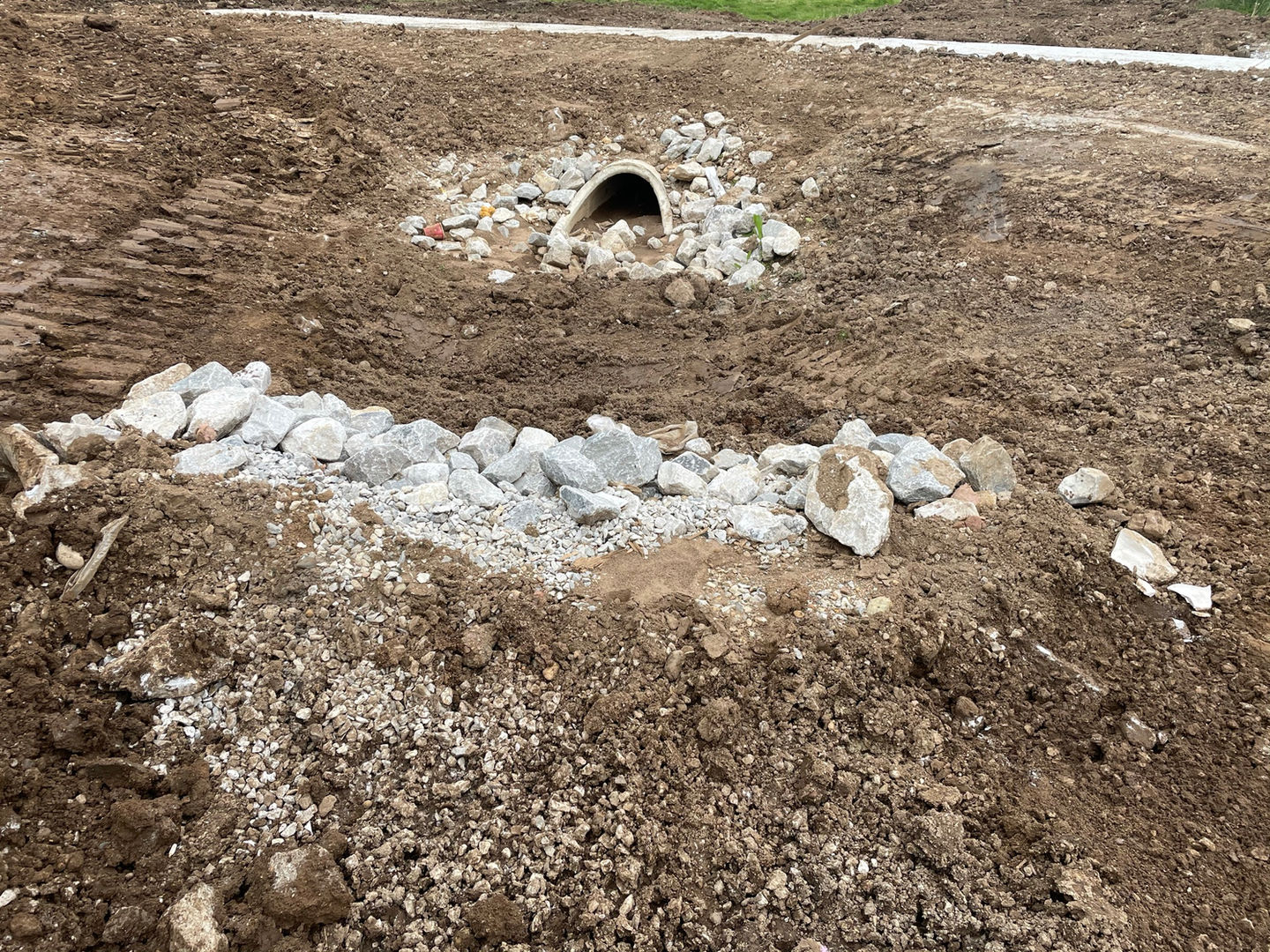 Benchmark Excavation LLC In The Process Of Installing A Culvert And Drainage Swale For A Large Commercial Complex In Indianapolis Indiana