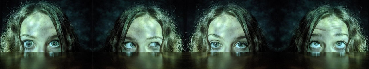 4 photos of Sabrina's head, making different faces. When you hover over, the heads switch positions.