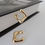 Miniatura: Brinco  liso Argola torcido. Folheado ouro 18k