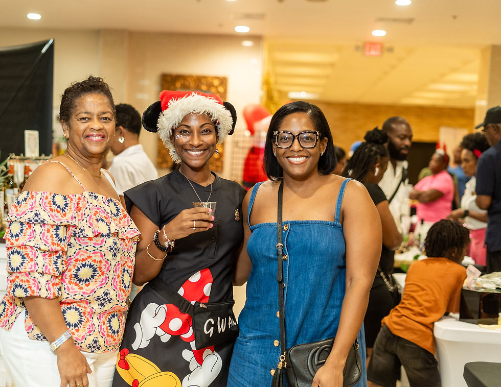 Christmas Connection Cheer with Sheron Gilzean, joined by Suga Lifestyle CEO Gabrielle Burgess (centre) and her daughter, Sasha Gilzean (far right).