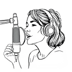 A woman recording into a podcasting microphone.png