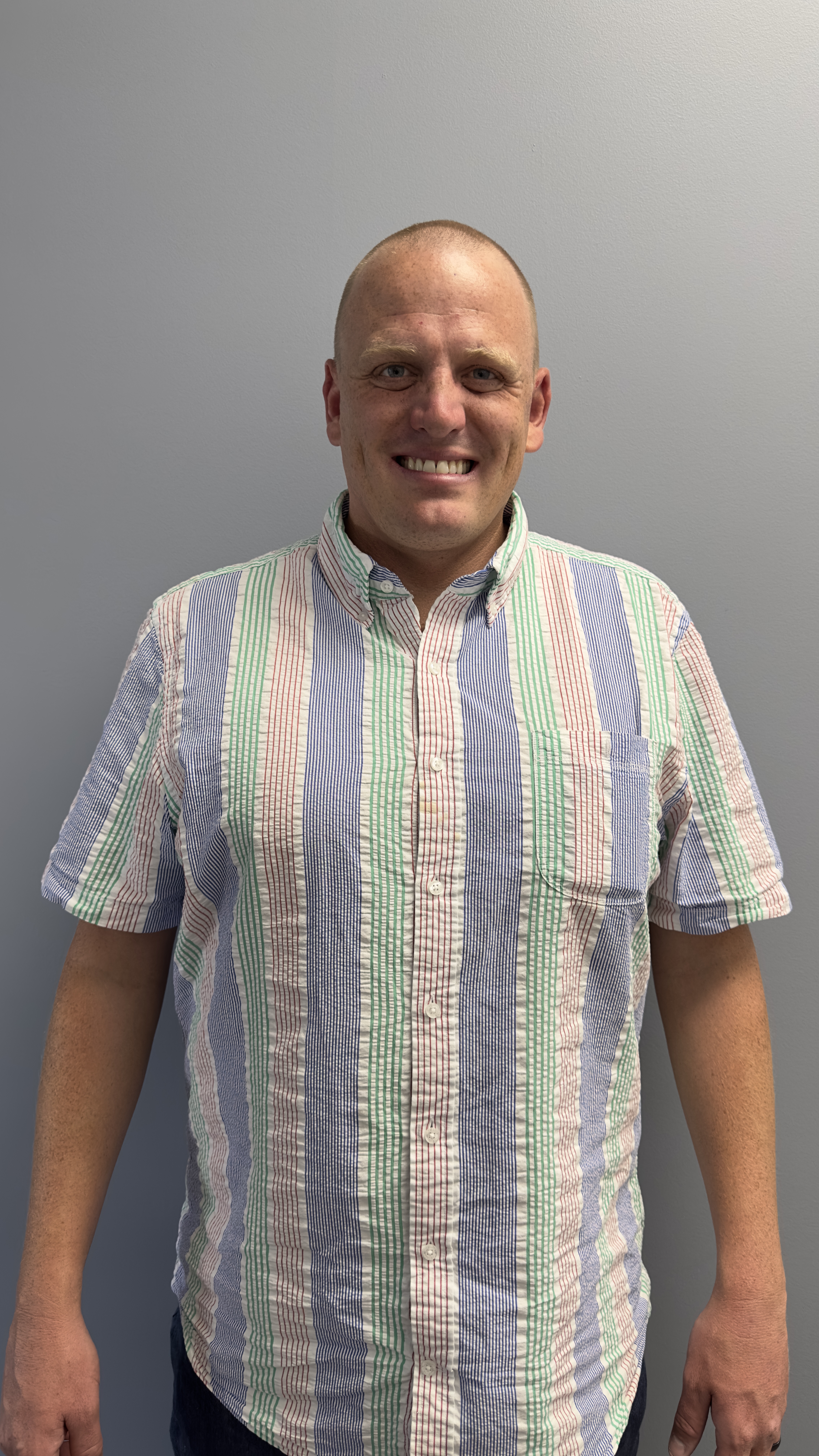 Professional headshot of an English instructor.