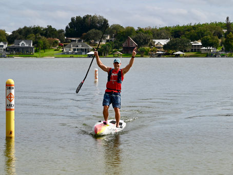 John Batson, paddleboarder, winning Last Paddler Standing race
