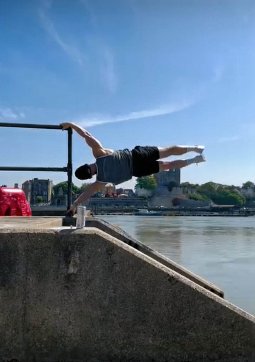 James doing a human flag on a hand railing