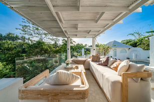 Open jungle terrace at Villa Feliz in Ubud Bali with lounge area and tropical views