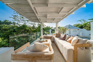 Open jungle terrace at Villa Feliz in Ubud Bali with lounge area and tropical views