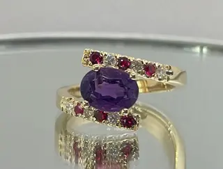 14K yellow gold ring with an oval Brazilian amethyst, rubies, and natural diamonds — exclusive design by Marchioness Jewelry Boutique, custom jewelry Toronto.