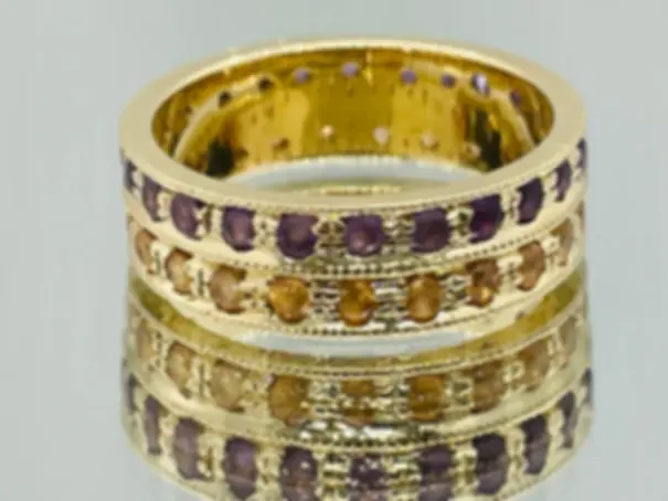 14K yellow gold custom ring with two rows of yellow and blue sapphires, luxury handmade design and expert gemstone setting
