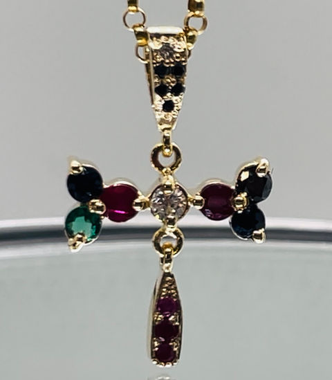18K yellow gold bow tie pendant with white diamond, rubies, sapphires, black diamonds, and emeralds. Custom jewelry. Jewelry repair in Toronto available.