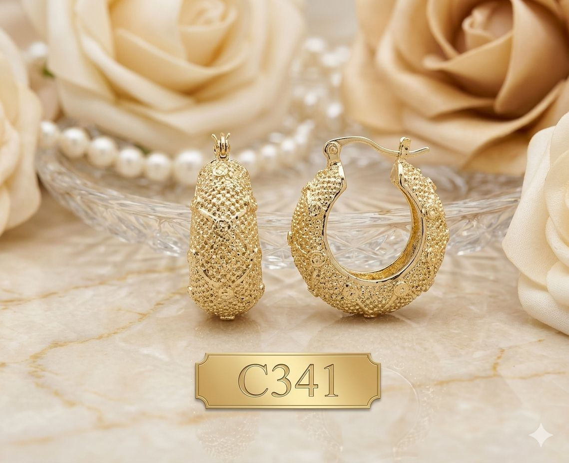 Aritos laminado de oro 18k estilo argollas ovaladas con textura granulada