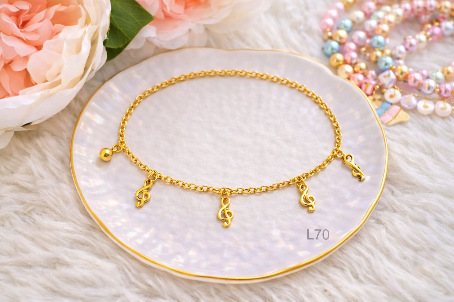 Pulsera para niña con dijes de notas musicales