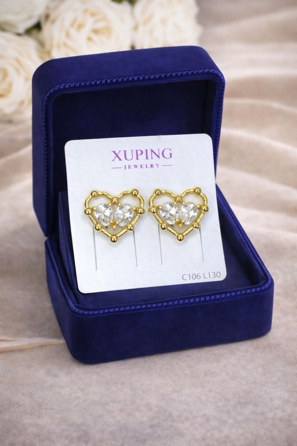 Aritos laminado de oro 18k diseño corazón doble con zirconias