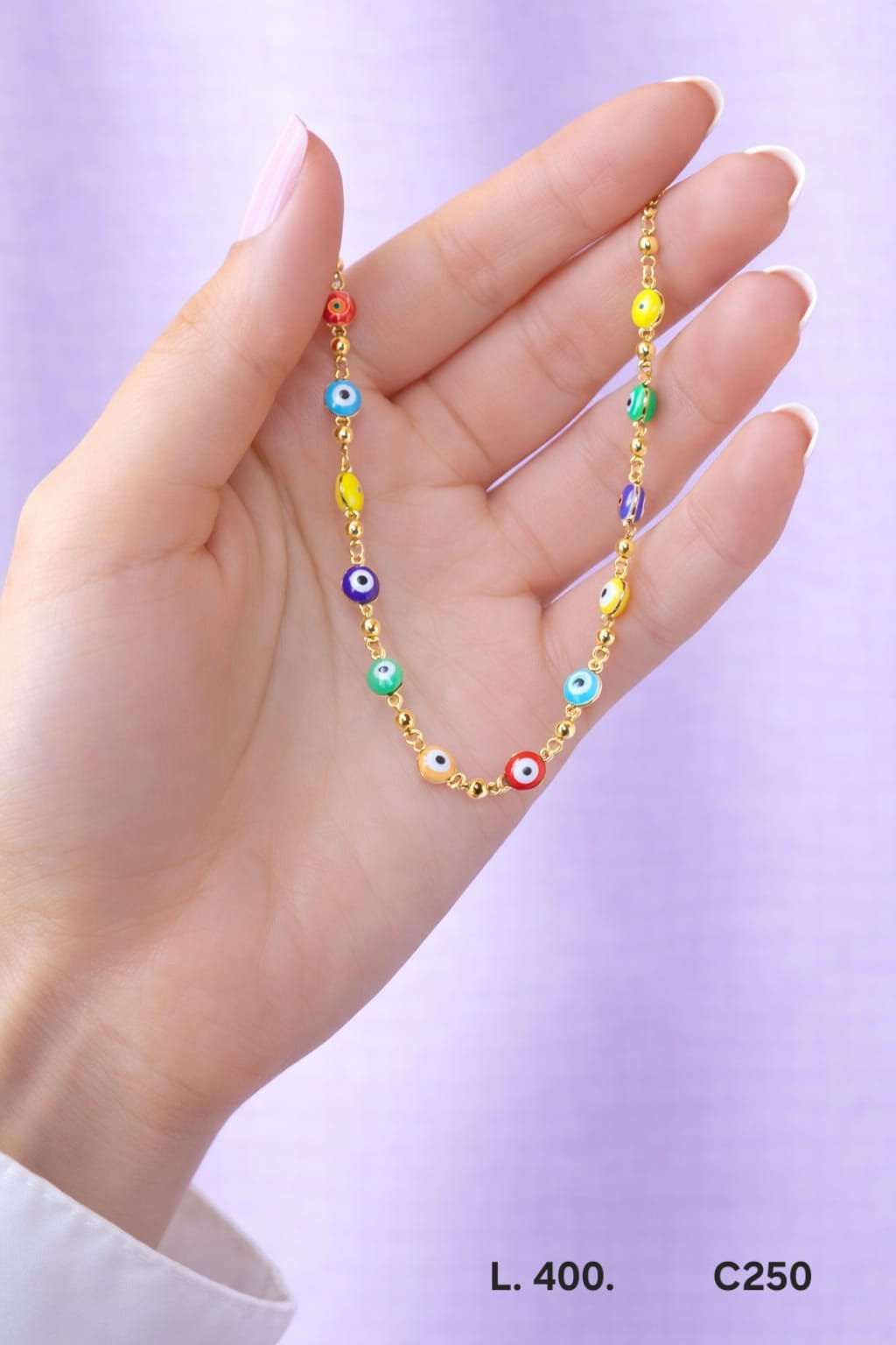 Pulsera laminado de oro 18k con dijes multicolor estilo ojo turco