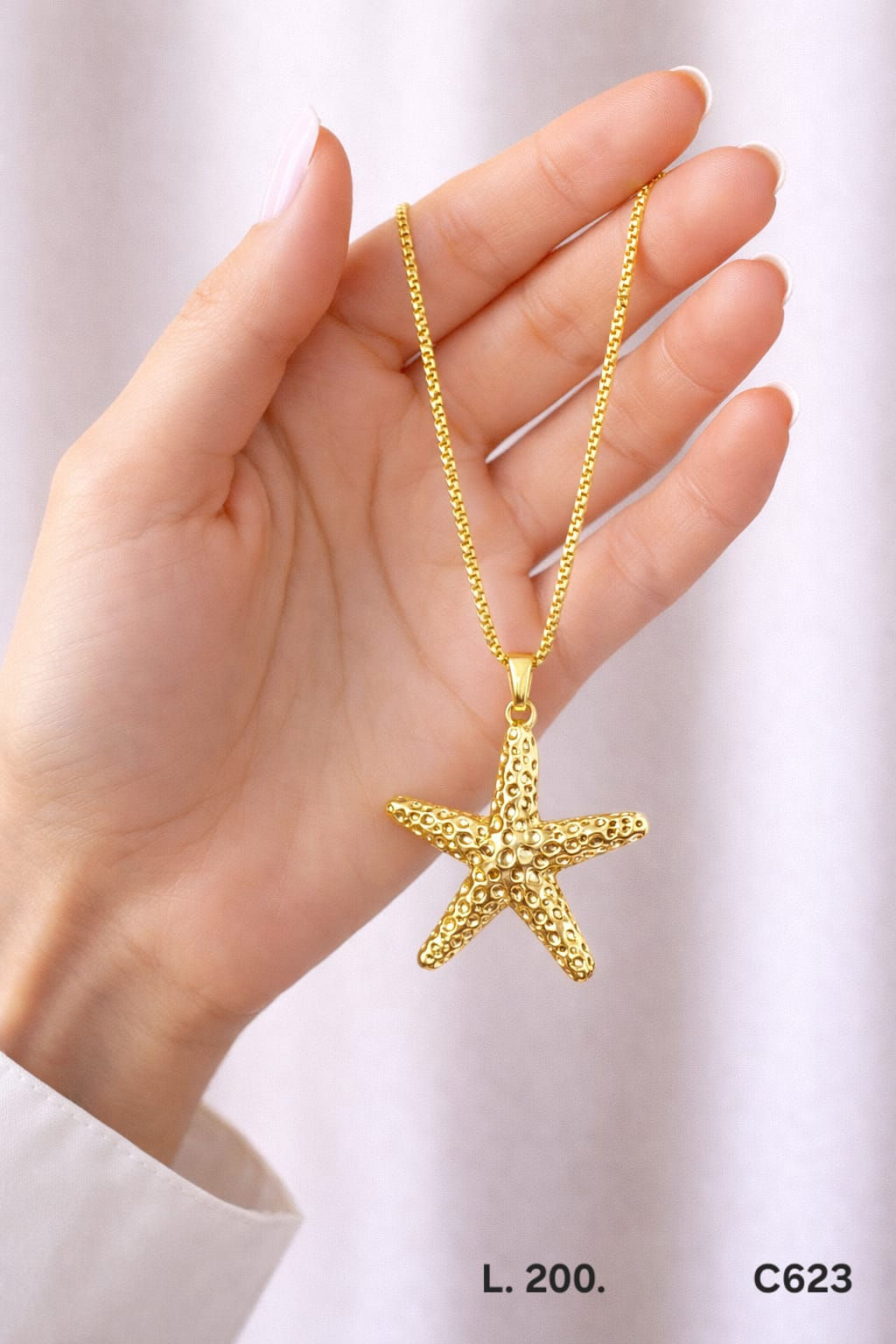 Cadena laminado de oro 18k diseño estrella de mar textura marina