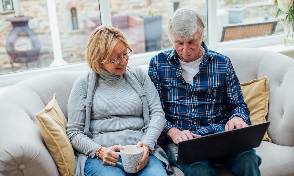 Couple sitting using laptop.jpg