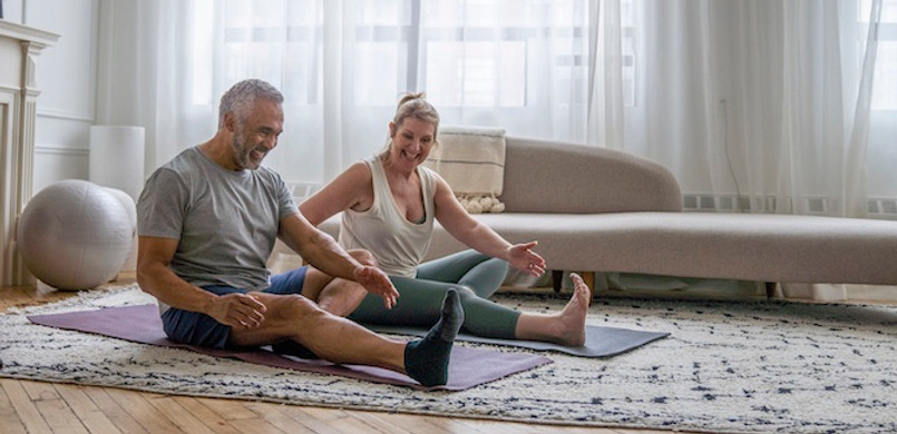Couple Stretching at Home.jpg
