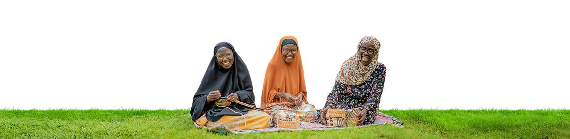 Three happy Uganda textile makers in eyeglasses