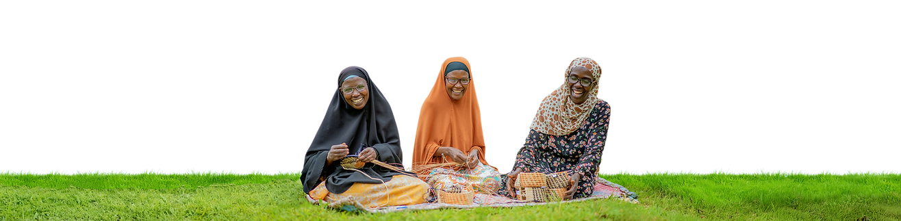 Three happy Uganda textile makers in eyeglasses