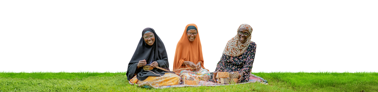 Three happy Uganda textile makers in eyeglasses