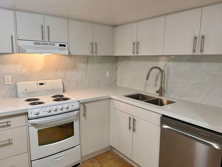 Legal basement kitchen in Toronto rental suite conversion.