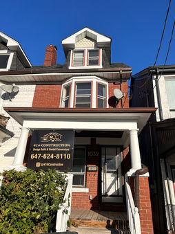 Rental conversion project exterior in Toronto showing duplex triplex renovation and separate entrance construction.