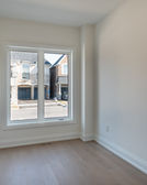 Bedroom interior in Burlington custom home rebuild.