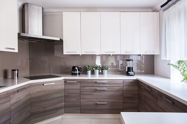 Modern Kitchen, White Sleek Cabinets, Glossy Grey Backsplash, Stainless Steel Range Hood, Smooth Surface Electric Cooktop