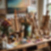 ART SUPPLIES AND OIL PAINTS AND CANVAS ON WOODEN TABLE, EARTHY VIBE, FLOWERS ON TABLE, OIL