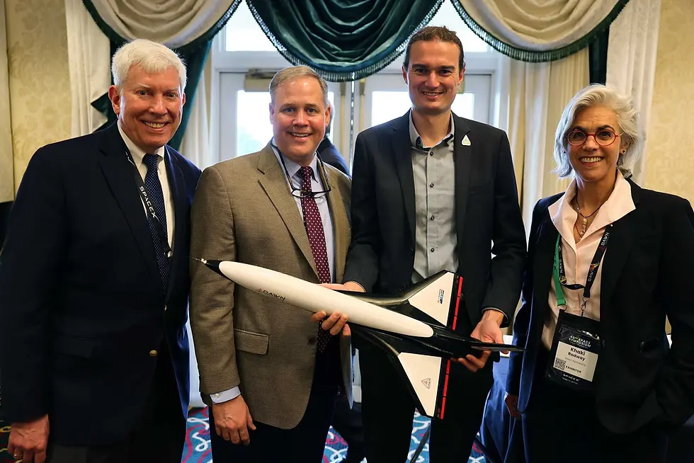 Caption: Dr. George Nield (Chairman, Global Spaceport Alliance), Jim Bridenstine (Managing Partner of the Artemis Group and Former NASA Administrator), Stefan Powell (CEO, Dawn Aerospace), and Khaki Rodway (Spaceplane Sales & Operations Director, USA, Dawn Aerospace) unveil the future—literally in hand—with a sub-scale Aurora spaceplane at the Oklahoma Breakfast during Space Symposium 2025 in Colorado Springs. Photo credit : Dawn Aerospace.