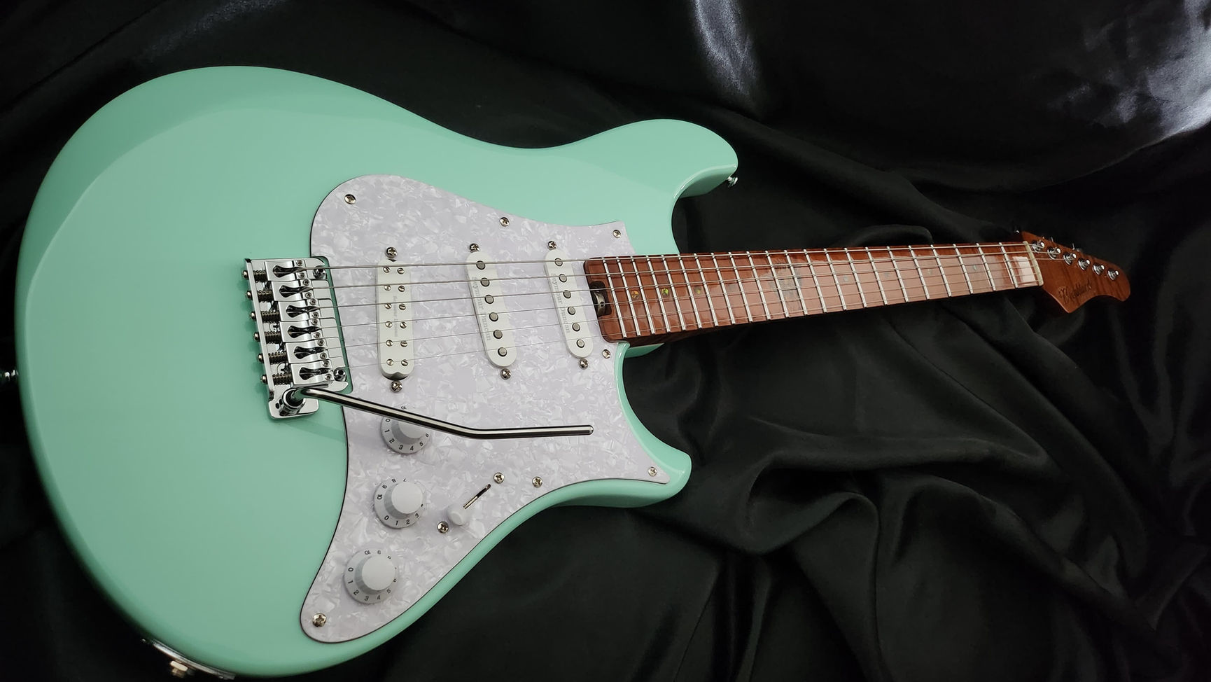 Mint green handmade custom guitar