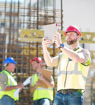 construction-worker-with-digital-tablet-in-constru-2024-09-23-02-09-09-utc.jpg