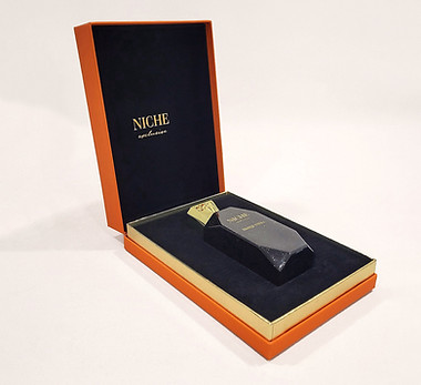 Premium perfume box with hinged lid opening.