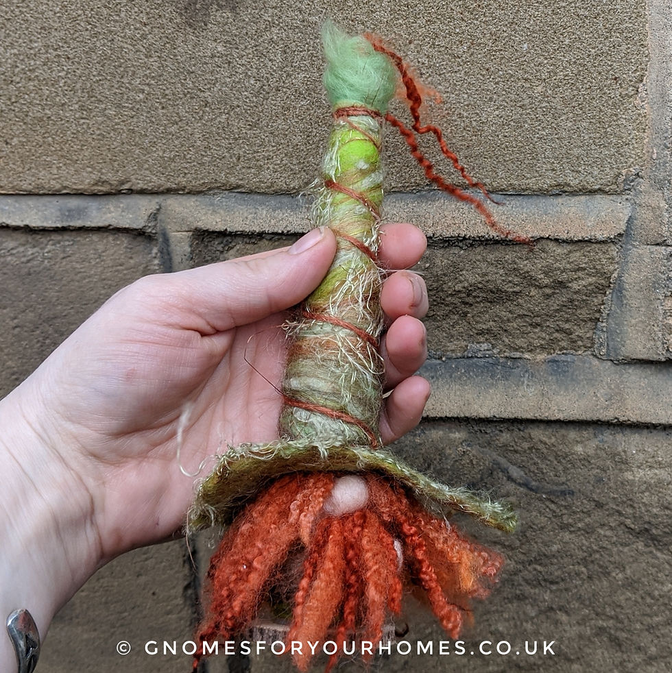 small gnome for your home, bright greens and browns with a leaf hat and bright red hair