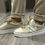 Thumbnail: Beige sneakers met gouden veters en metallic detail