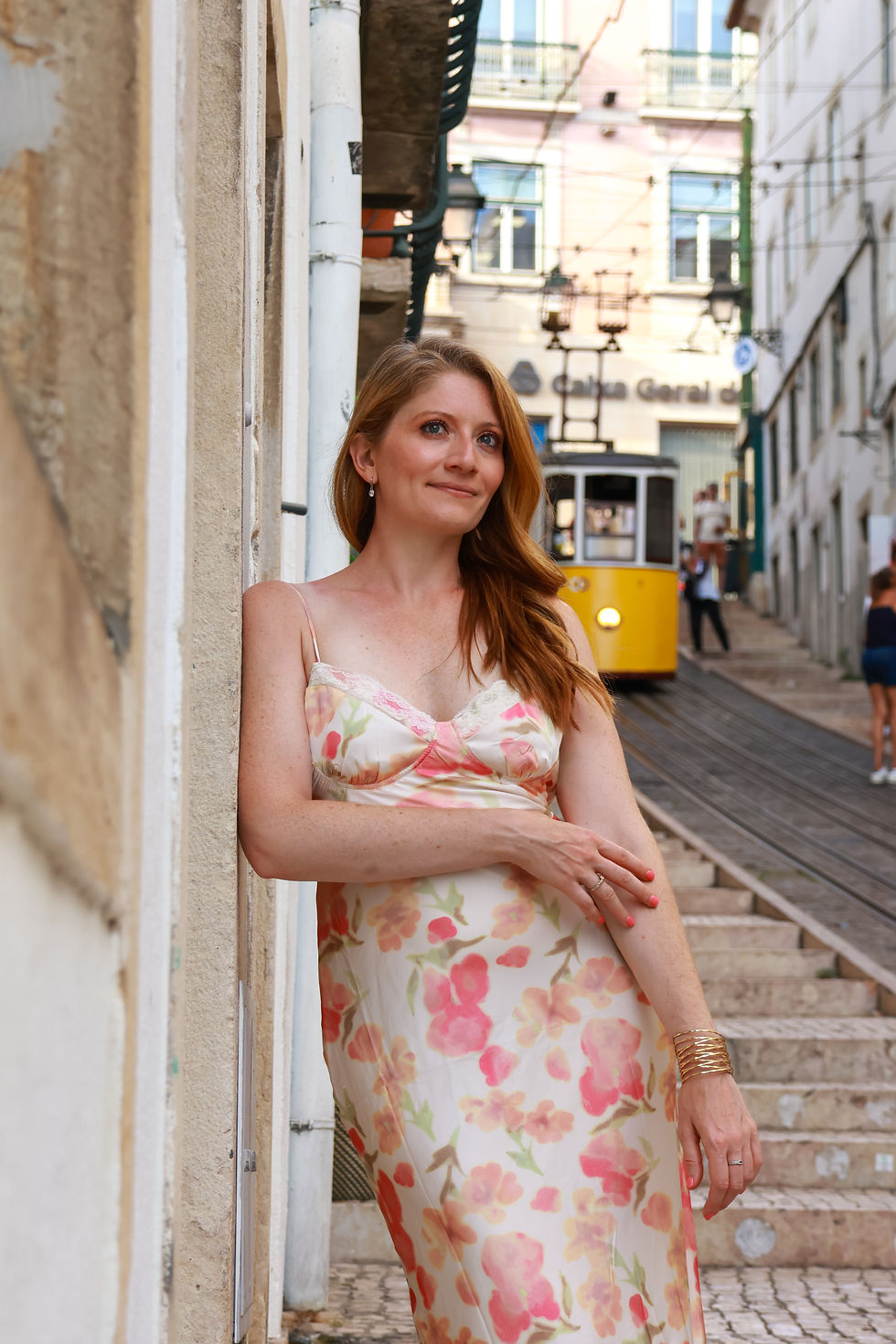 Stylish portrait of a woman near the famous Lisbon tram, blending classic charm and urban energy, captured by Foty