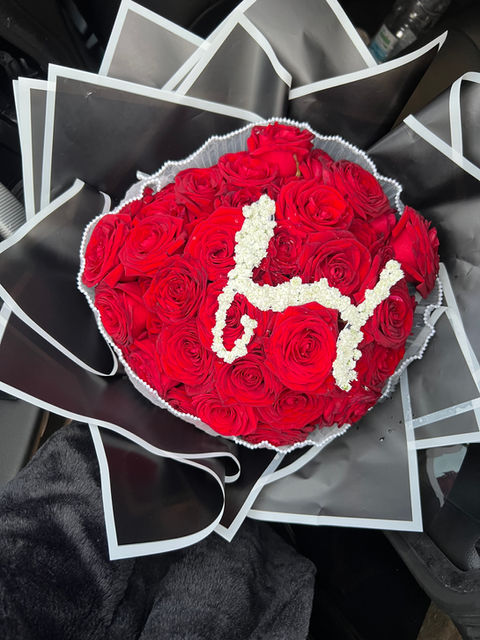 Gratify Gift's luxe red roses bouquet with personalised letter initial is one that shouts iconic in a classic way!