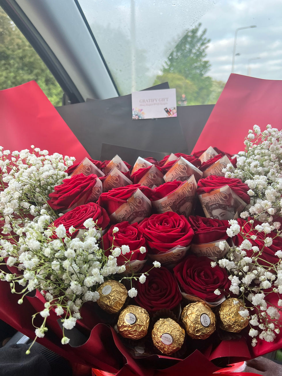 Thumbnail: Red flower arrangement with roses and baby's breath