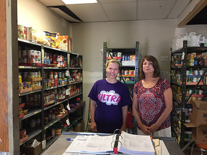 mother and daughter helping at the Eureka Food Pantry