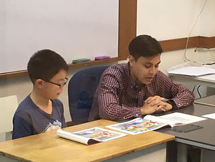 Ryan Cullen conducting a speakaing exam