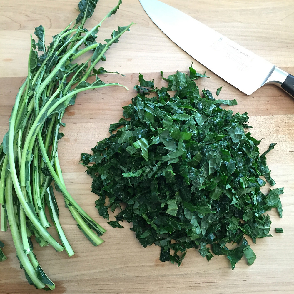 Chef's knife and herbs