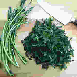 Chef's knife and herbs