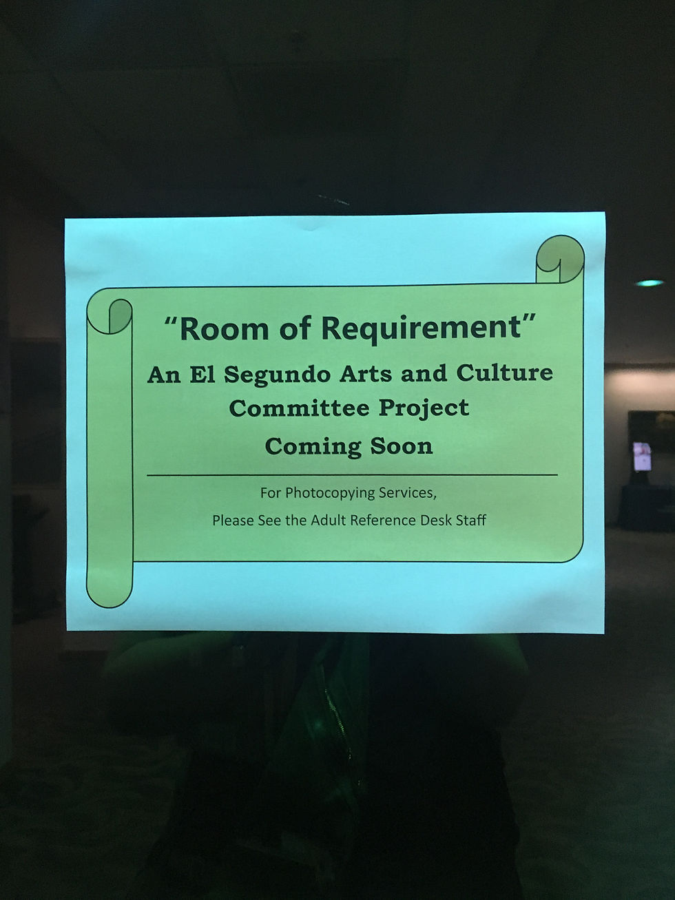 A sign introducing the Room of Requirement is posted on a door at the El Segundo Public Library
