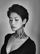 Conceptual self-portrait of Hiroko Masuda exploring identity and transformation.