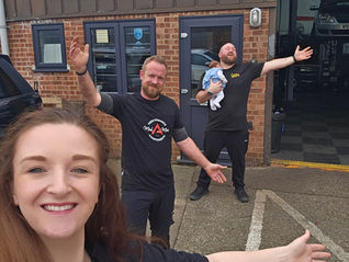 The Torque Monkey garage team outside the workshop welcoming everybody to feel confident to use the workshop for their car needs.