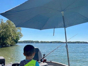 The Boating Hack We Swear By: How a Fishing Umbrella Saved Our Toddler's Naptime