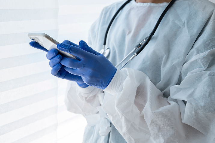 side-view-doctor-holding-smartphone.jpg