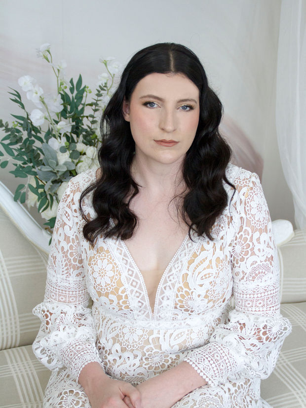 Boho wedding gown with A-line skirt, V-neckline, bishop sleeves, and lowered back – Regan, a romantic and unique bridal dress.