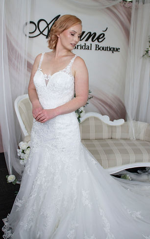 this is a traditional yet modern fishtail lace wedding dress on sale at ansune bridal boutique located in melbourne australia